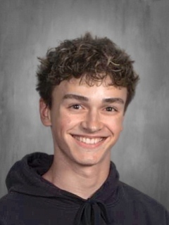 High school student poses for yearbook photo