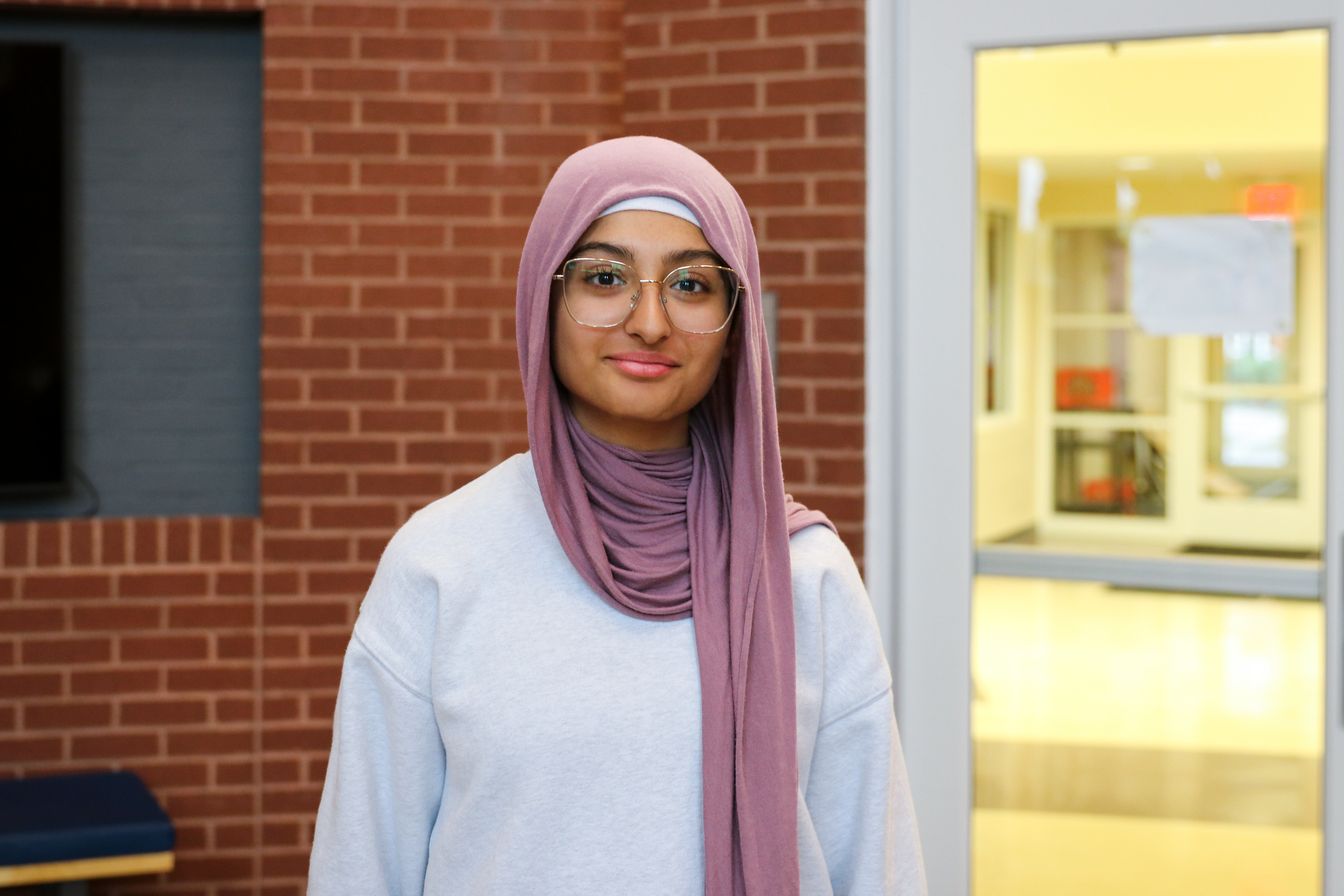 High school student poses for headshot