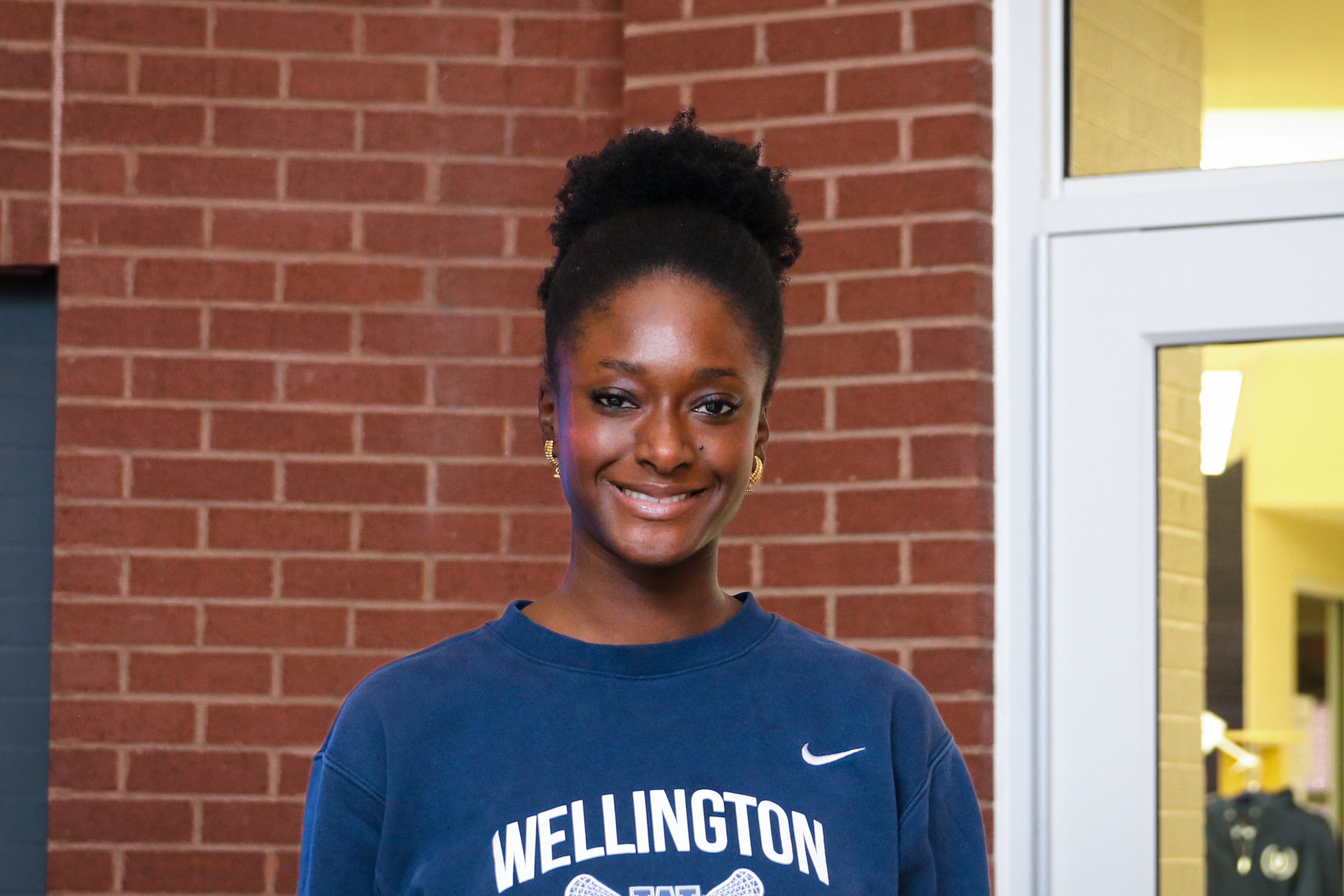 High school student poses for headshot