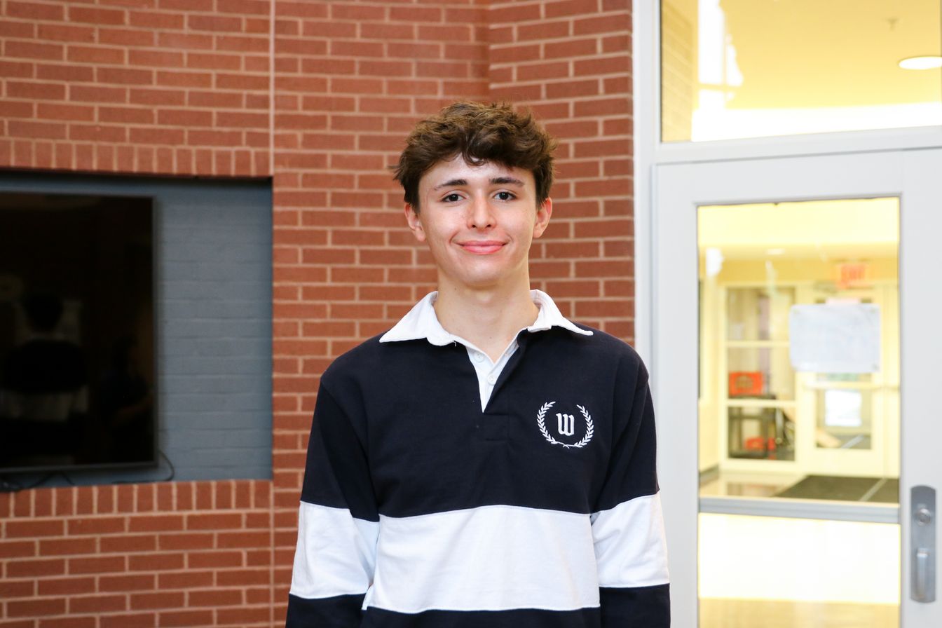 High school student poses for headshot