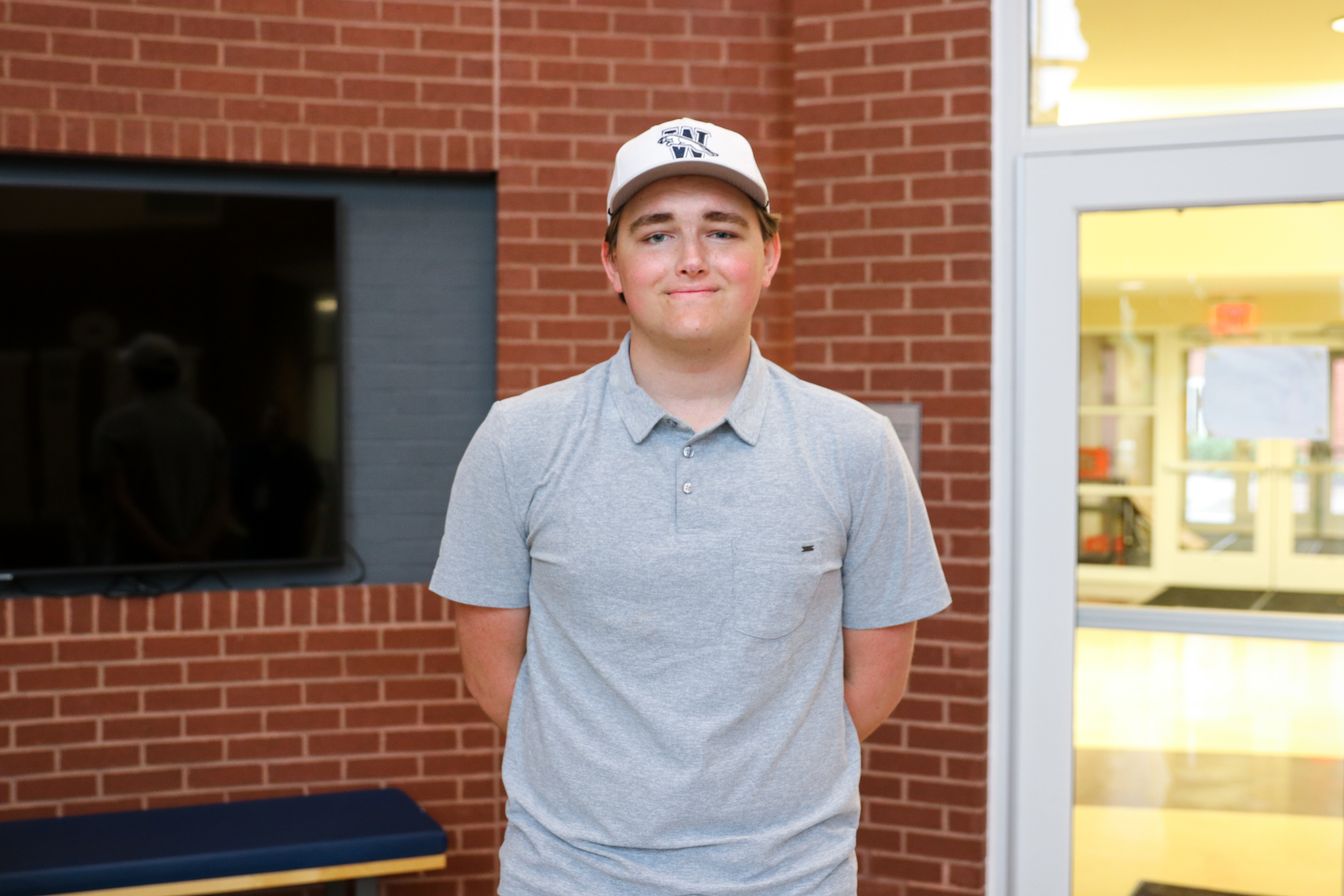 High school student poses for headshot