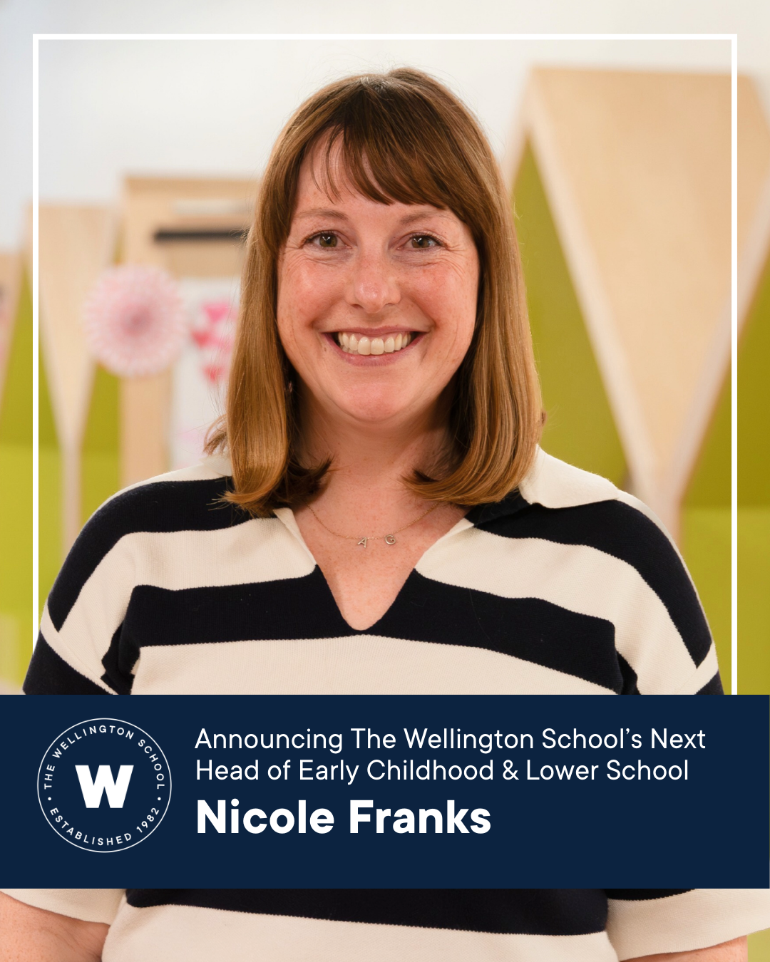 Woman smiles for professional headshot